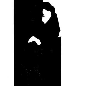 Mann am Tisch sitzend